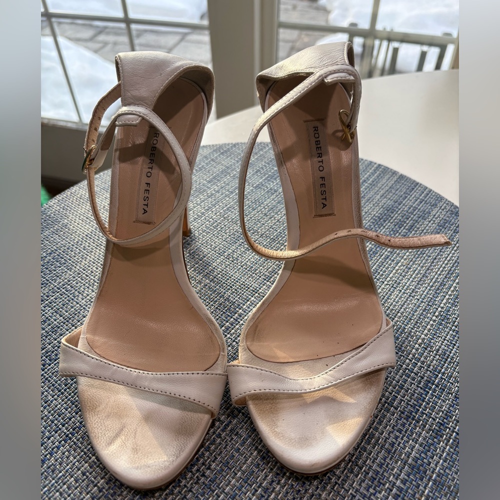 White Roberto Festa sandals.